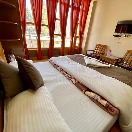 Hotel Mansarovar Inn Munsyari Buitenkant foto