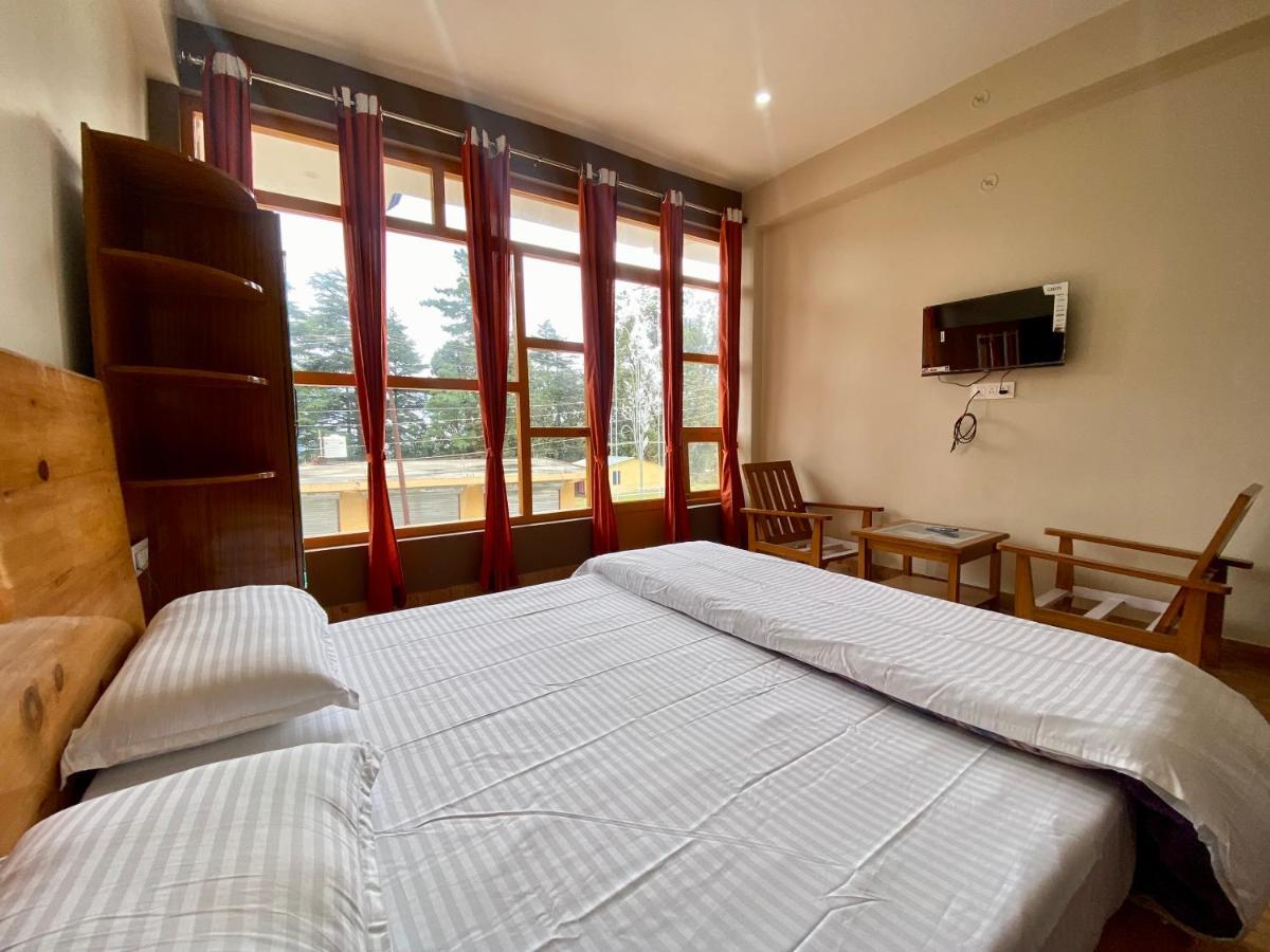 Hotel Mansarovar Inn Munsyari Buitenkant foto